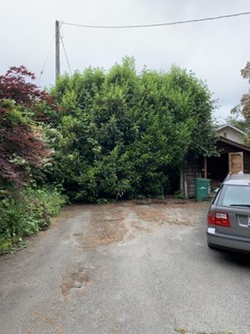 Urban driveway and lot area before hardscape refresh