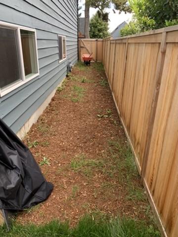 Side yard prepared for hardscape and drainage improvements